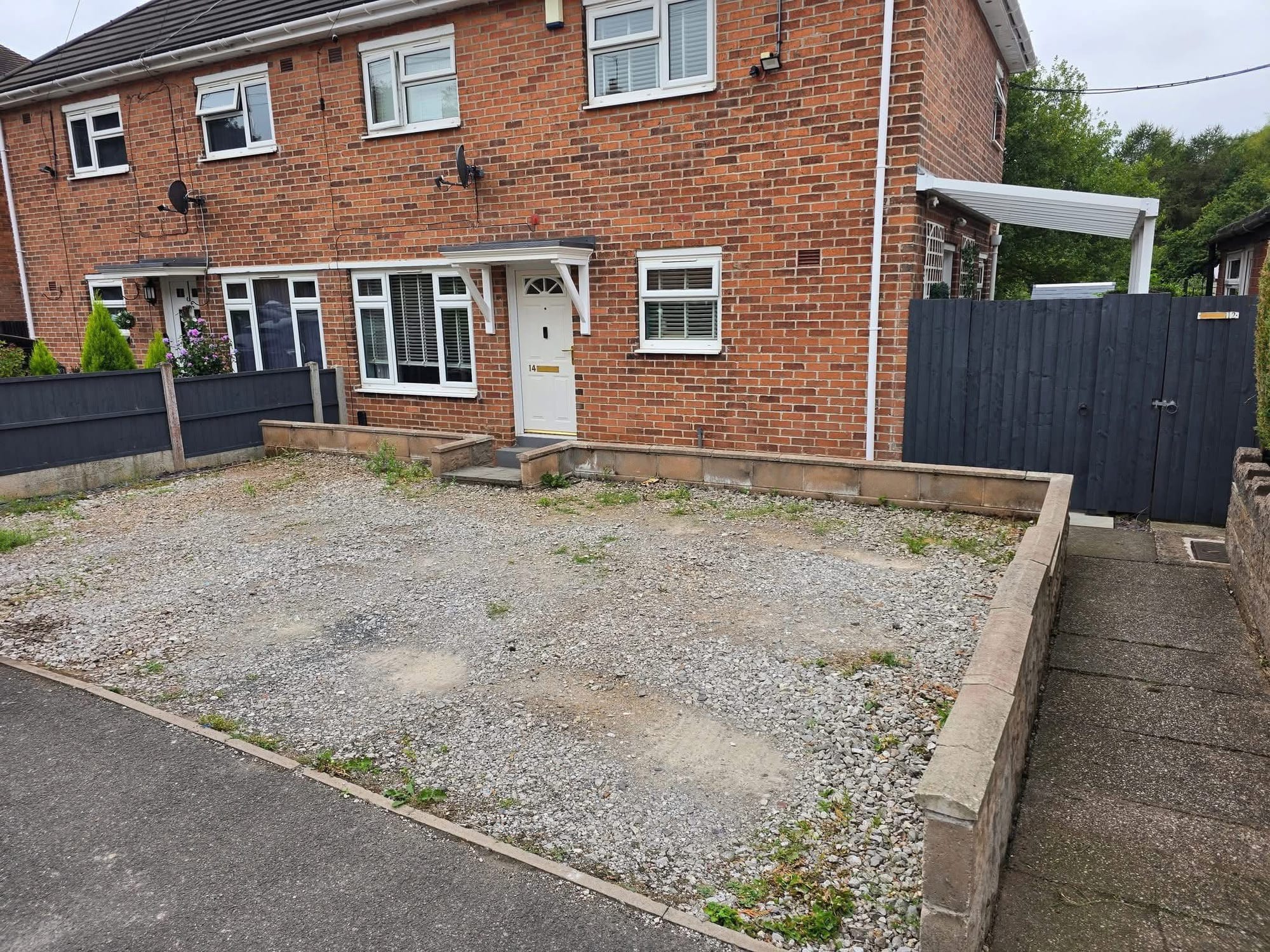 Worn hardcore to block paving — before