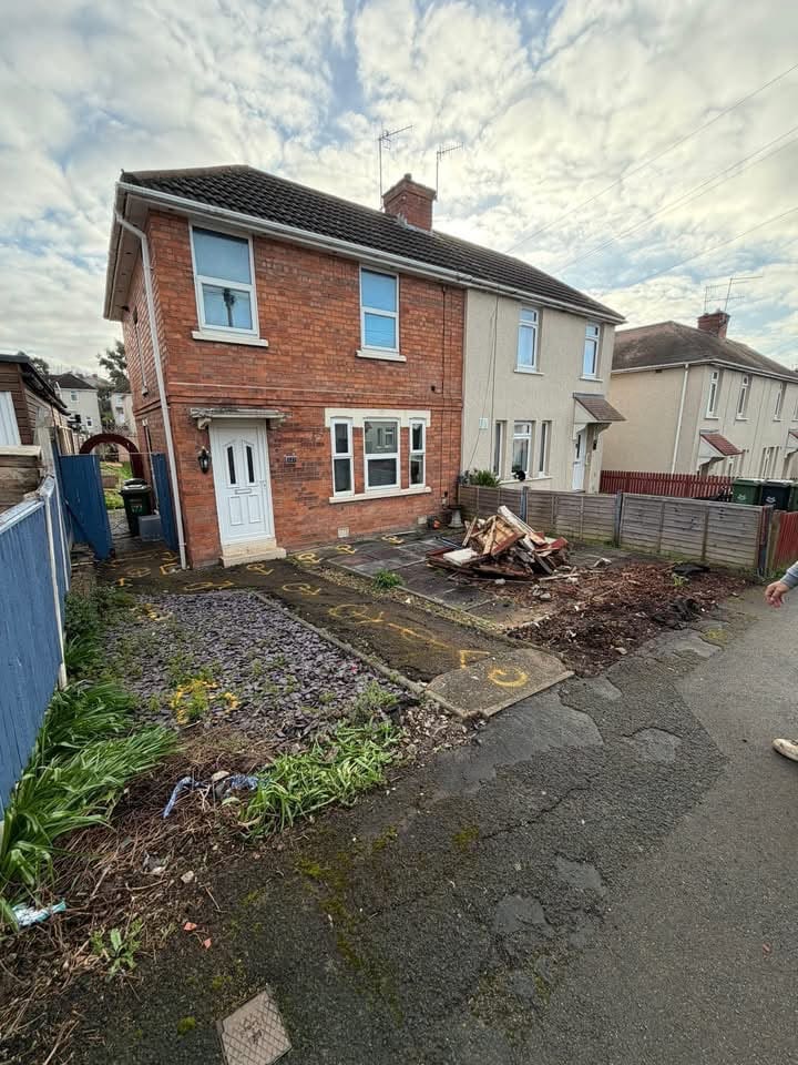 Overgrown frontage rebuilt — before